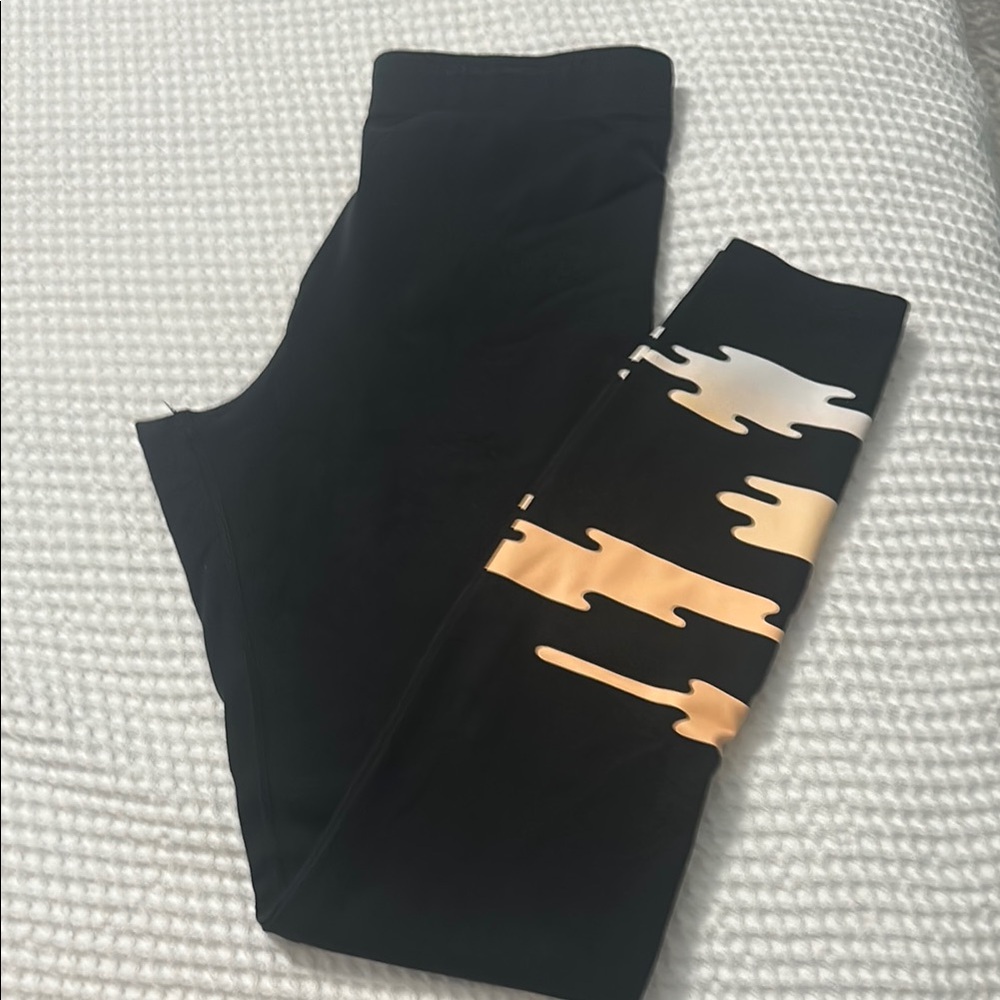 Nike Black and Gold Leggings with Stylish Accents pink Nike logo size small